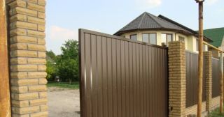 Купить откатные ворота из профнастила Гудермес, цена от 1800 руб.